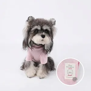 Pink soft fleece dog sweater with cute cartoon patch for small pets like Schnauzers