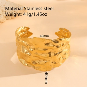 Irregular textured gold stainless steel cuff bracelet with 40mm wide hammered finish