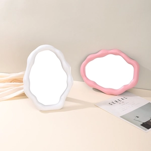 Nordic cloud-shaped plastic makeup mirrors in white and pink with wavy borders
