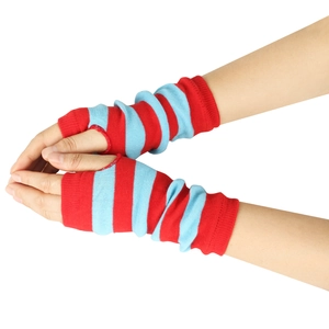 Detail of red and blue striped knitted arm warmers showing soft texture and fingerless design