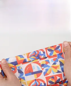 Close-up showing the high elasticity of the patterned outdoor cycling bandana fabric