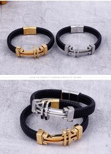 Detailed view of black woven leather bracelets with gold and silver stainless steel clasps