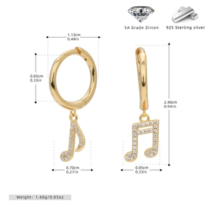 Detailed view of gold S925 sterling silver music note earrings with 5A zircon inlay