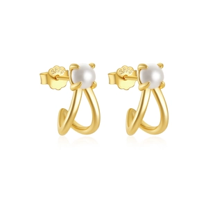 Macro shot of S925 sterling silver stamp on gold-plated pearl cross earrings