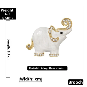 Detailed view of rhinestone elephant brooch with 3.7cm length and 6.3g weight specs