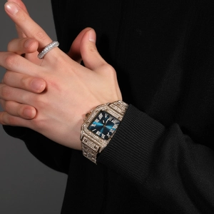 Luxury gold iced-out square watch with blue Roman dial and sparkling rhinestones