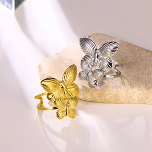 Minimalist stainless steel butterfly open rings in gold and silver with textured wings