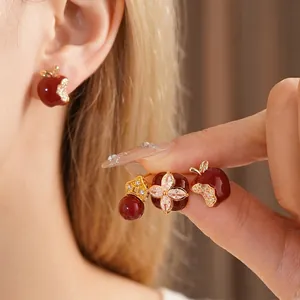 Luxurious red apple and flower stud earrings with crystals in vintage gold finish