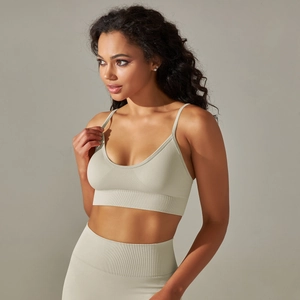 Seamless light green yoga sports bra and high-waisted leggings set with ribbed texture