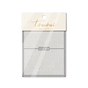 5D embossed nail art sticker featuring grey plaid patterns in professional retail packaging