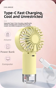 Detail of a portable mini mist fan with Type-C fast charging port and USB cable