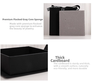 Detail of premium black cardboard jewelry box with plush grey sponge lining and ribbon