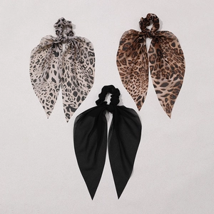 Three-piece leopard print and solid black chiffon bow scrunchies with long silk streamers