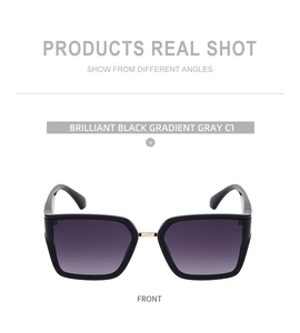 Front view of square black sunglasses with gradient gray lenses and polished frames