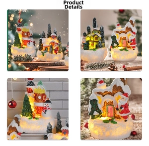 Detailed views of lighted resin Christmas house figurines with Santa and snowman motifs