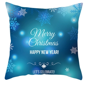 Detailed view of blue snowflake pillowcase with Merry Christmas and Happy New Year text