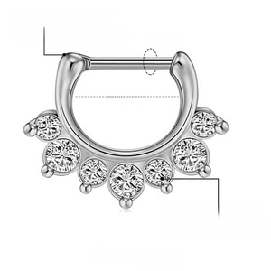 Macro detail of 10mm stainless steel septum ring with seven sparkling crystal inlay balls