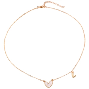 Minimalist alloy necklace with double heart pendants in gold finish on white background