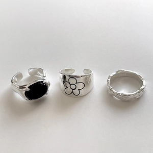 925 silver adjustable rings set with black onyx flower engraving and textured finish
