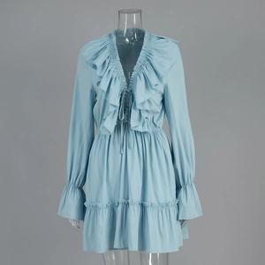 Detailed view of baby blue V-neck dress with ruffles, bell sleeves and drawstring front