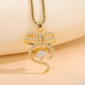 Elegant 18k gold plated bow and heart pendant necklace with shimmering zircon stones