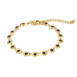 Gold hollow heart bracelet with black center links and adjustable lobster clasp