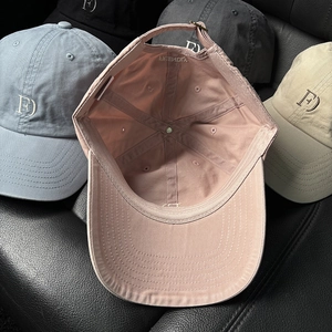 Cotton baseball caps with FD embroidery in assorted pastel colors and adjustable metal buckle