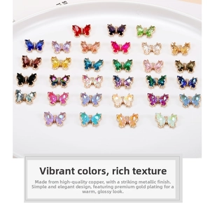 Detailed macro view of colorful gradient crystal butterfly pendants in 24 diverse colors