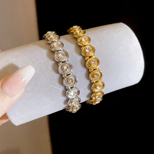 Sparkly geometric oval elastic bracelet with inlaid crystals in gold and silver finish