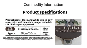 Detailed view of 30cm eucalyptus door hanger being weighed on a digital scale