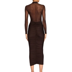 Detail view of the back of a sheer brown mesh long sleeve top and ruched maxi skirt set