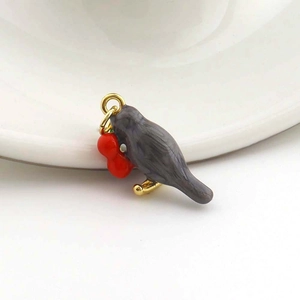 Bird-shaped copper pendant with grey enamel and red berries for DIY jewelry