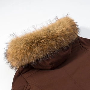 Detail shot of the fluffy faux fur collar and textured hood on the brown parka jacket