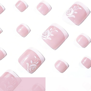 Pink French toenail press-on kit with elegant white rose floral designs on square nails