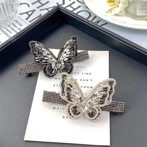 Elegant pair of butterfly hair clips with sparkling crystals and rhinestones