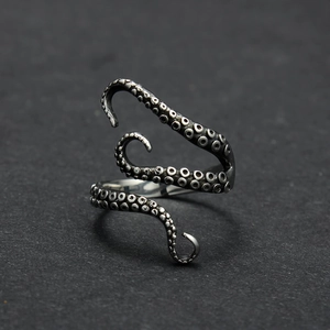 Macro view of octopus tentacle ring detailing suction cups with vintage oxidized finish