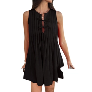 Chic black sleeveless pleated mini dress with a stylish keyhole neck and tie details