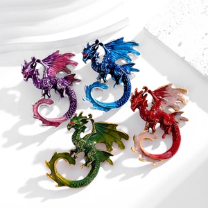 Vivid pterodactyl brooches with colorful enamel finish and sparkling red rhinestone eyes
