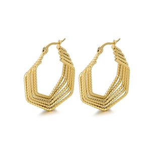 Twisted geometric gold hoop earrings with multi-layered hexagonal cable texture detail