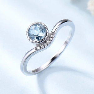 Elegant curve 925 silver ring with round blue gemstone and side cubic zirconia