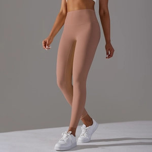 Close-up of high-waist nude yoga pants made with premium elastic seamless sports fabric