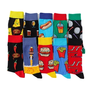 Colorful cotton crew socks with fun cartoon food and sports patterns on white background