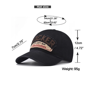 Detailed view of black baseball cap with rocker embroidery and product size measurements