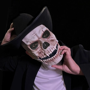 Realistic white skull mask for Halloween cosplay with a movable jaw on a black background