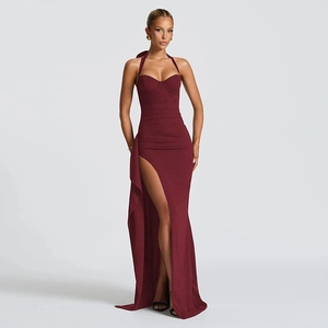 Detailed view of elegant wine red halter neck dress with high slit and slim fit design