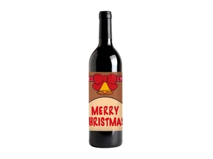 Detail of premium gold foil Christmas label with Merry Christmas text on black wine bottle