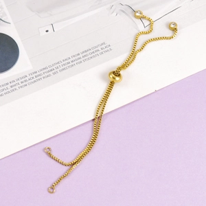Adjustable golden stainless steel box chain bracelet with slider bead and zircon charms