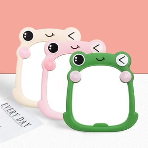 Cute frog-shaped desktop vanity mirrors in cream white, pink, and green colors