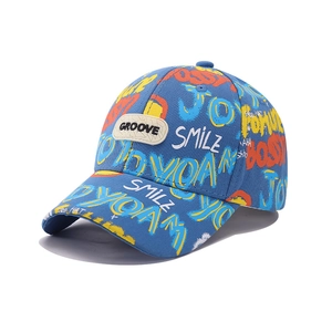 Kids smile graffiti baseball cap in vibrant blue with colorful pop art prints