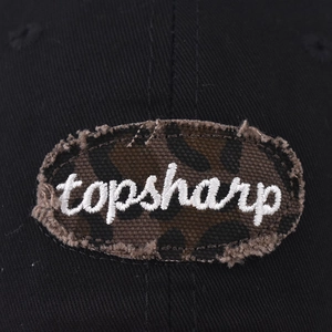 Casquette en coton délavé noir avec écusson léopard et détails de broderie topsharp